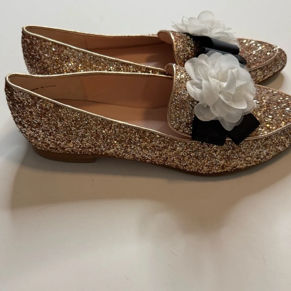 Kate Spade Brown and Black Flats with Floral Accents